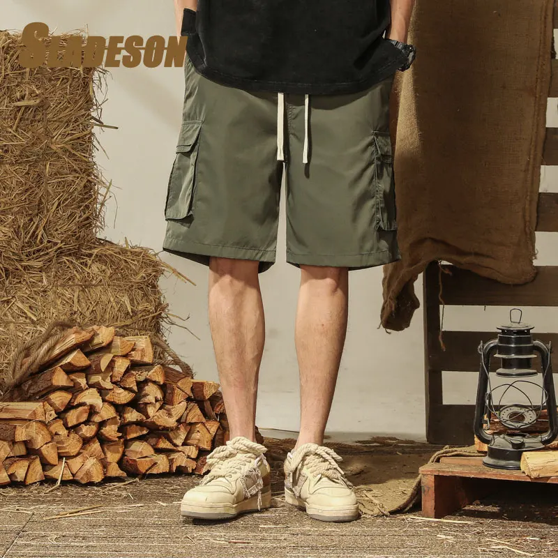 Summer Shorts Men Cargo Pants Men High Quality Cotton Soild Loose Safari Style Big Pockets Streetwear Drawstring Homme Pants Men
Summer Shorts Men Cargo Pants Men High Quality Cotton Soild Loose Safari Style Big Pockets Streetwear Drawstring Homme Pants Men