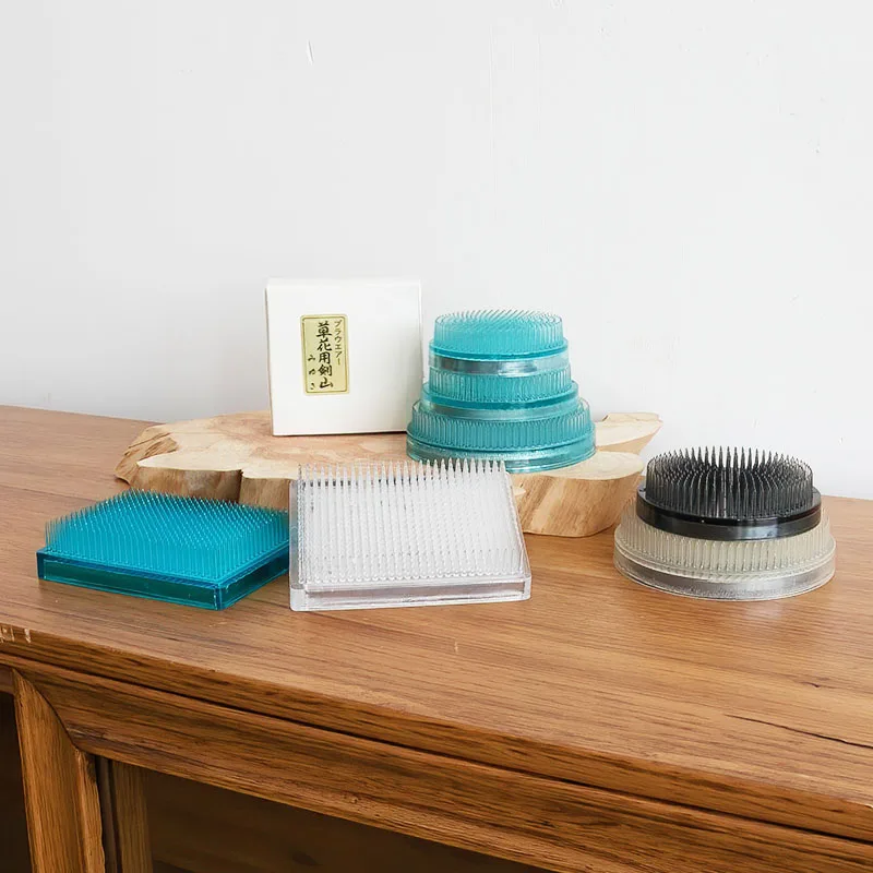 Japan Imported Plastic Transparent Kenzan Flower Art Chinese Zen Floral Garden Arrangement Tools
Japan Imported Plastic Transparent Kenzan Flower Art Chinese Zen Floral Garden Arrangement Tools