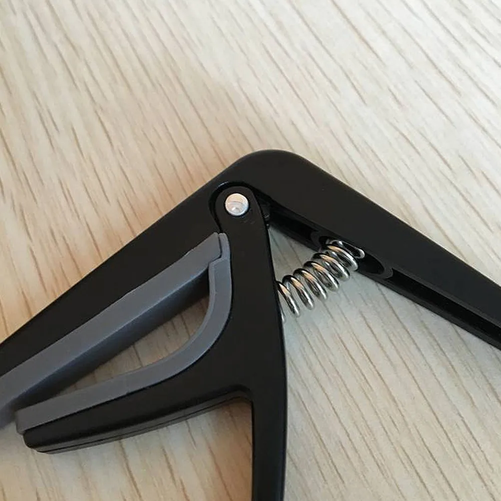 6.6*6.6*1cm Ukulele Capo For Tuning Hawaii Guitar Professional Quick Change Tuning Clamp 4 String Durable Hot Nice
6.6*6.6*1cm Ukulele Capo For Tuning Hawaii Guitar Professional Quick Change Tuning Clamp 4 String Durable Hot Nice