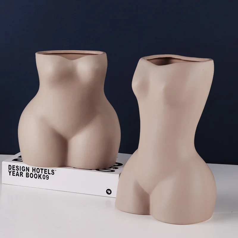 Creative female body art ceramic vase living room TV cabinet flower arrangement flower decoration office crafts furnishings
Creative female body art ceramic vase living room TV cabinet flower arrangement flower decoration office crafts furnishings
