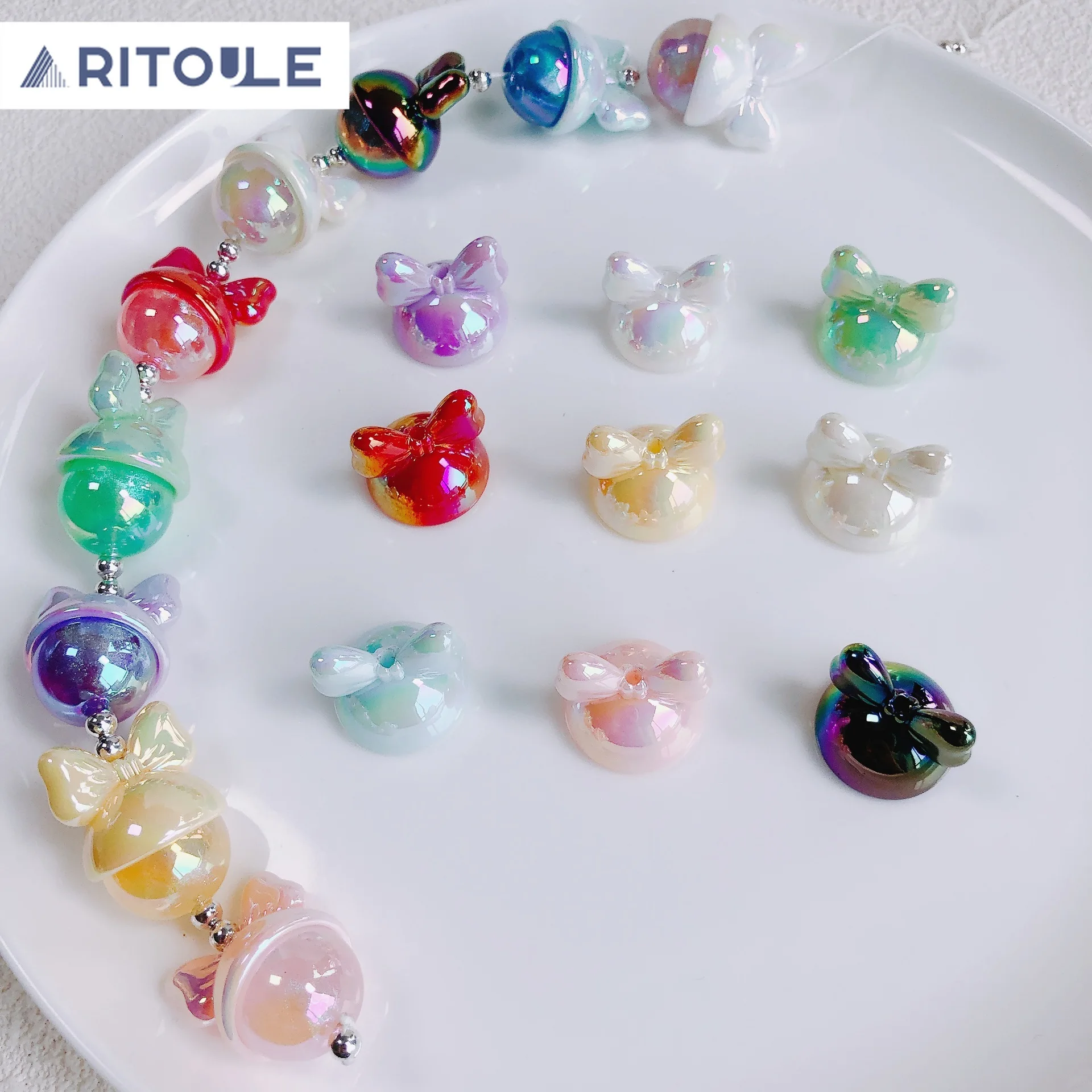 Colorful bow acrylic hat cute ears diy beaded mobile phone chain bag hanging handmade bead hat material.
Colorful bow acrylic hat cute ears diy beaded mobile phone chain bag hanging handmade bead hat material.