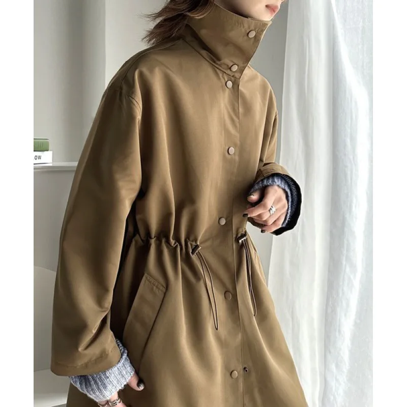 New Japanese And Korean Standing Collar Windbreaker Women's Autumn New Design Sense Tunic Waist Loose Mid Length Over Knee Coat
New Japanese And Korean Standing Collar Windbreaker Women's Autumn New Design Sense Tunic Waist Loose Mid Length Over Knee Coat