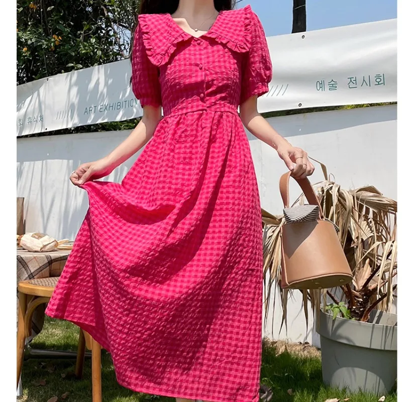 

2024 Chic Summer Women's Sweet Bubble Sleeve Spliced Pullover Doll Neck Button Checkered Fashion Versatile Short Sleeve Dress