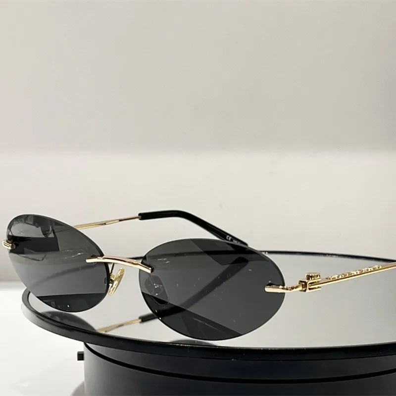 

New Fashion Retro Frameless Color Glasses Frameless Small Oval Retro Metal Women's Sunglasses, Suitable for Both Men and Women