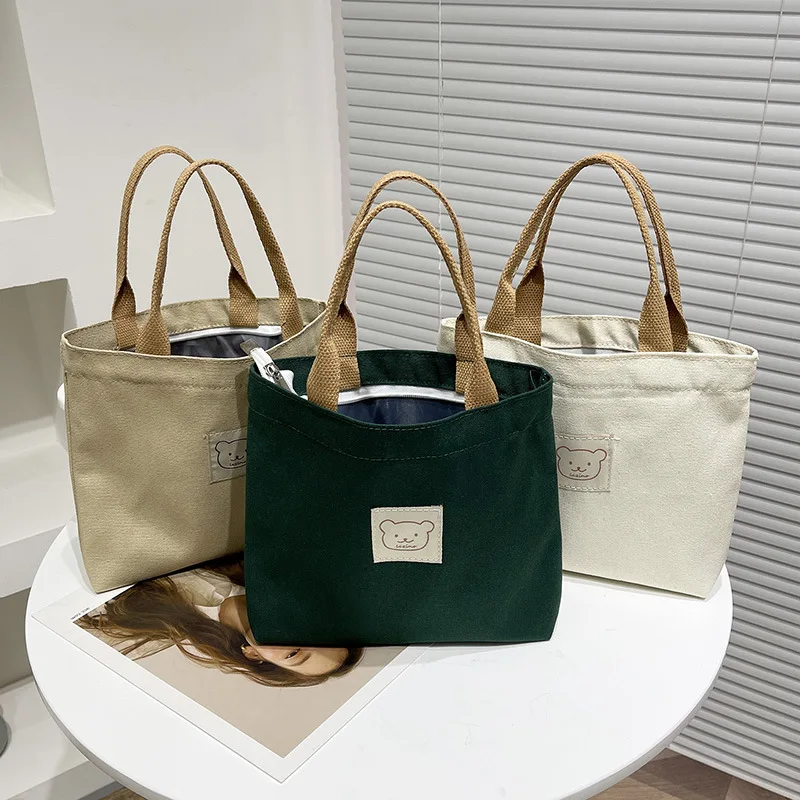 Women's bag niche design canvas handbag hand-carry lunch bag mommy bag handbag fashion trend canvas hand-carry
Women's bag niche design canvas handbag hand-carry lunch bag mommy bag handbag fashion trend canvas hand-carry
