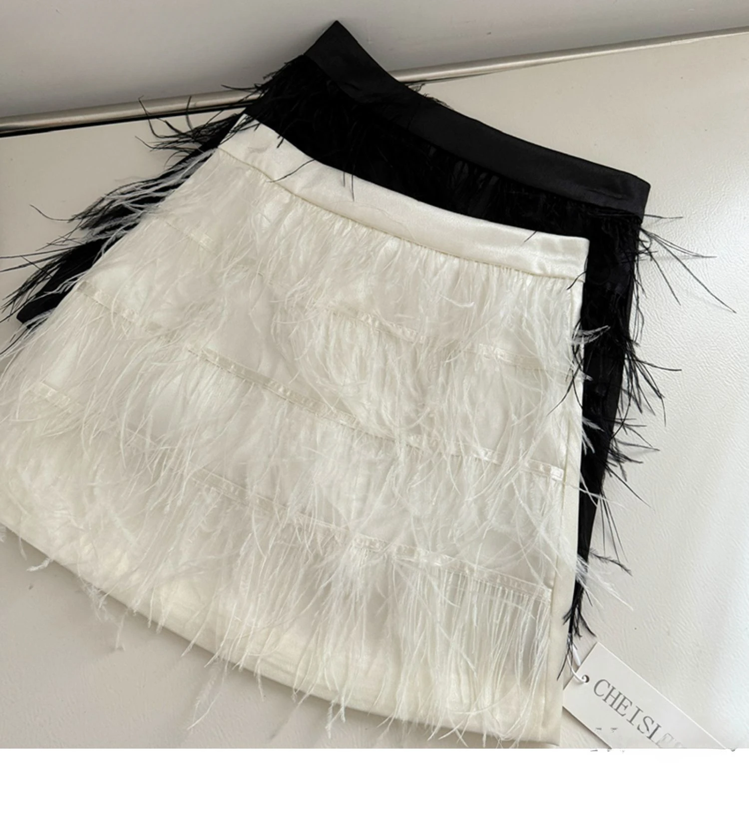 2023 Spring Summer New Design Sense Niche High Waist Feather Tassel Skirt for Women
2023 Spring Summer New Design Sense Niche High Waist Feather Tassel Skirt for Women