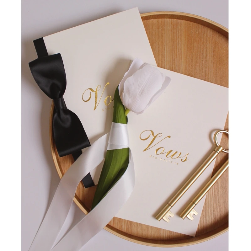 1 Pair New Style Tie and tulip Design Bronzing Wedding Vow Books with Pens Decoration Invite Gift Cards with Ribbon Vows Card
1 Pair New Style Tie and tulip Design Bronzing Wedding Vow Books with Pens Decoration Invite Gift Cards with Ribbon Vows Card