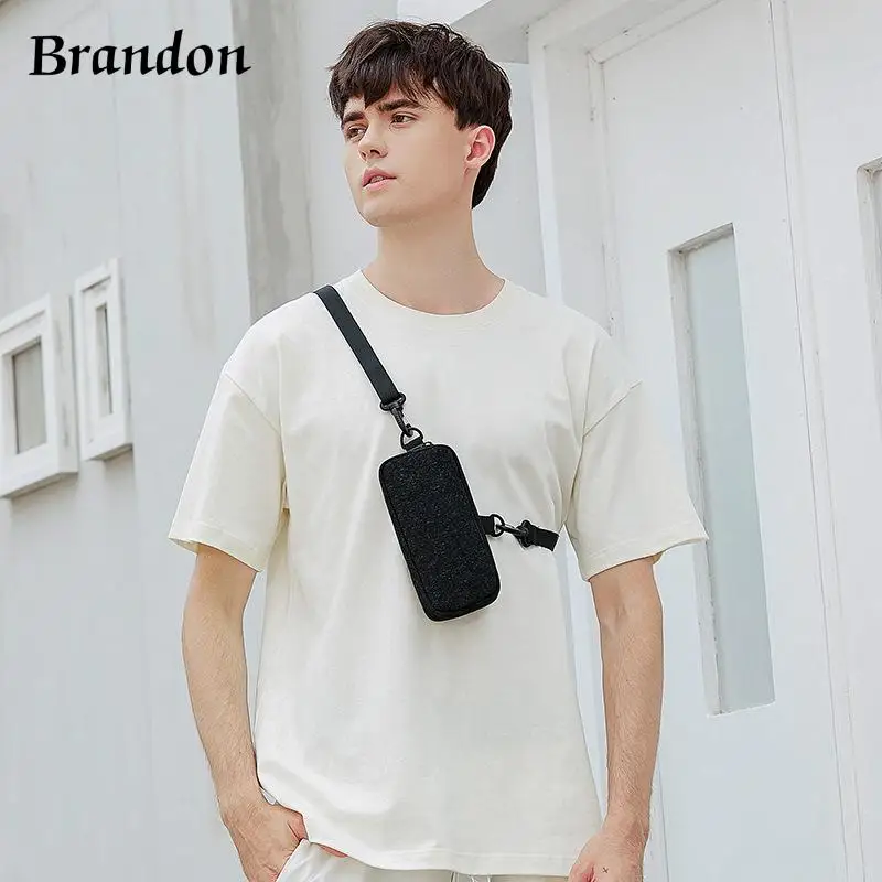 Designer unisex fashionable crossbody bag with neck hanging mobile phone bag portable mini casual change hanging bag
Designer unisex fashionable crossbody bag with neck hanging mobile phone bag portable mini casual change hanging bag