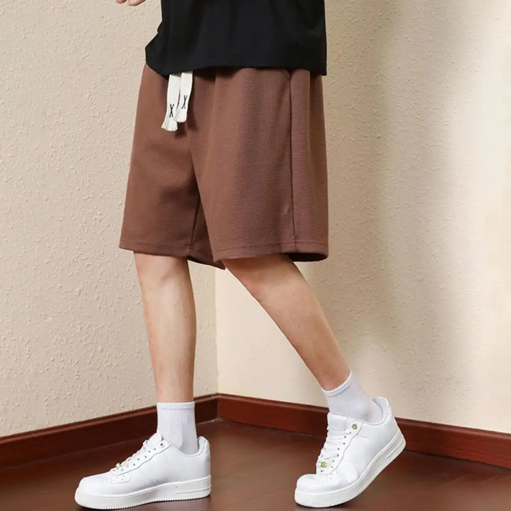 Elastic Waist Men Shorts Men's Waffle Texture Athletic Shorts with Elastic Waist Pockets Wide Leg Sport Shorts for Streetwear
Elastic Waist Men Shorts Men's Waffle Texture Athletic Shorts with Elastic Waist Pockets Wide Leg Sport Shorts for Streetwear