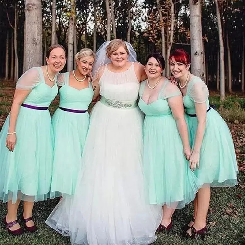 2023 Large Size Custom Tulle Sweetheart Collar Tea Long Bridesmaid Dress Cap Sleeve Ribbon Country Beach Wedding Party Dress
2023 Large Size Custom Tulle Sweetheart Collar Tea Long Bridesmaid Dress Cap Sleeve Ribbon Country Beach Wedding Party Dress