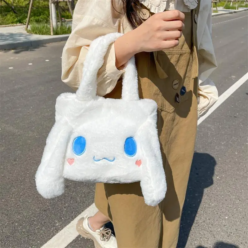 Sanrio Kawaii Cinnamoroll New 2022 Cartoon Cute Shoulder Bag Japanese Plush Bear Double-Sided Handbag Soft Cute Hairy Bun
Sanrio Kawaii Cinnamoroll New 2022 Cartoon Cute Shoulder Bag Japanese Plush Bear Double-Sided Handbag Soft Cute Hairy Bun