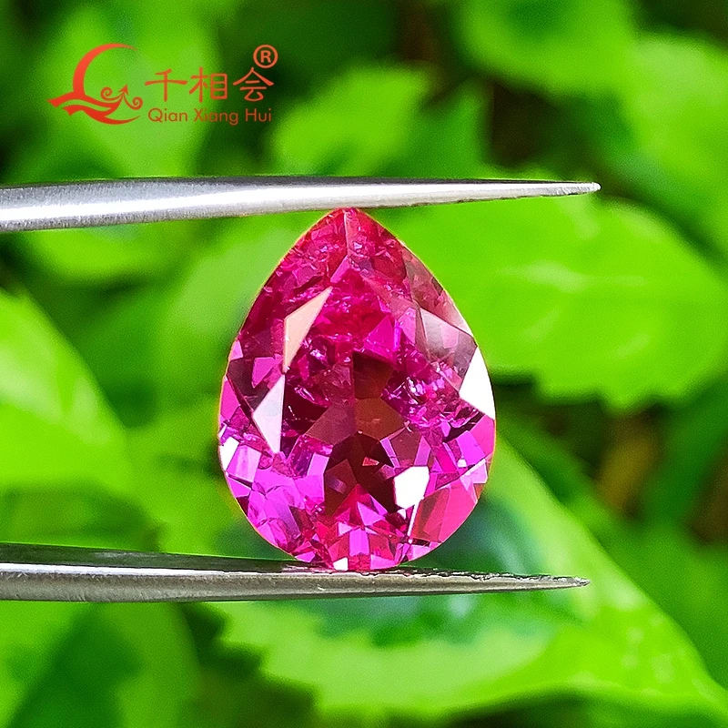 

pear shape ruby dark pink color artificial lab created ruby natural cut including minor cracks and inclusions loose gem stone