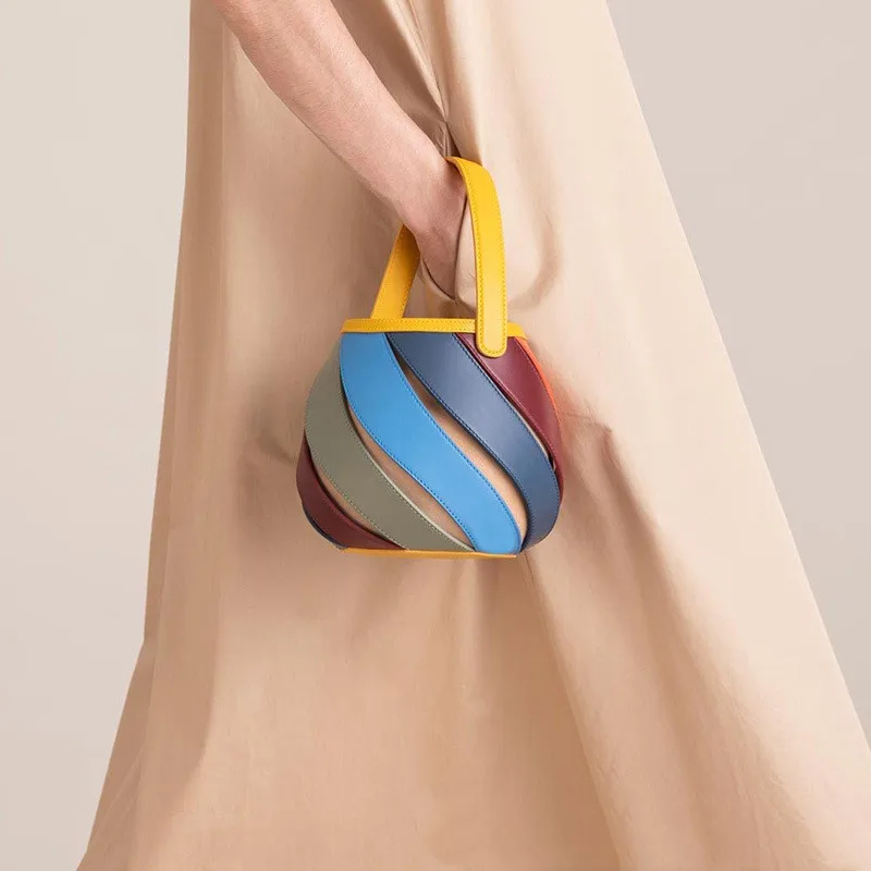 Spring and summer geometric color stitching cylinder bucket type shoulder messenger bag trend contrast color handbag women
Spring and summer geometric color stitching cylinder bucket type shoulder messenger bag trend contrast color handbag women