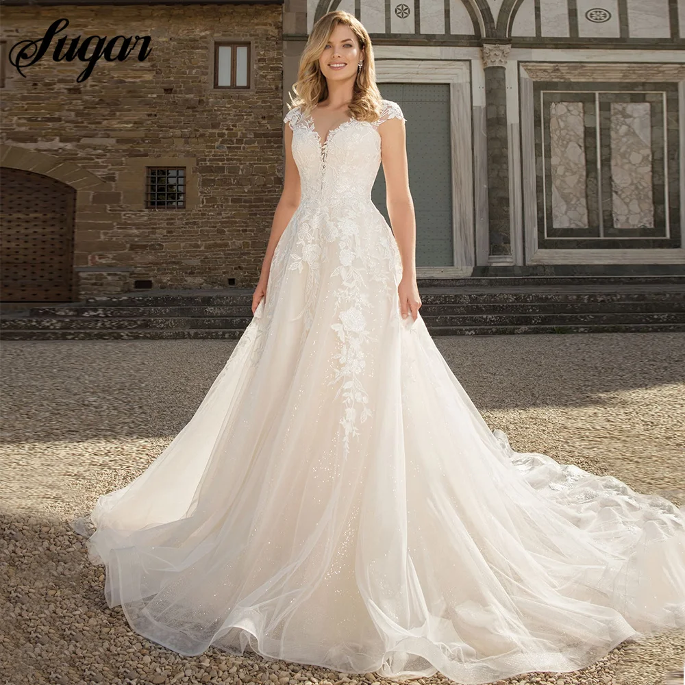 Gorgeous Wedding Dresses Sheer Neck Cap Sleeve A-Line Lace Appliques Button Tulle Bridal Gown Sweep Train Vestidos De Noiva
Gorgeous Wedding Dresses Sheer Neck Cap Sleeve A-Line Lace Appliques Button Tulle Bridal Gown Sweep Train Vestidos De Noiva