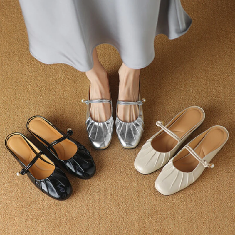 

Wearing thick soled bun toe half slippers in spring and summer, sequin sandals for women