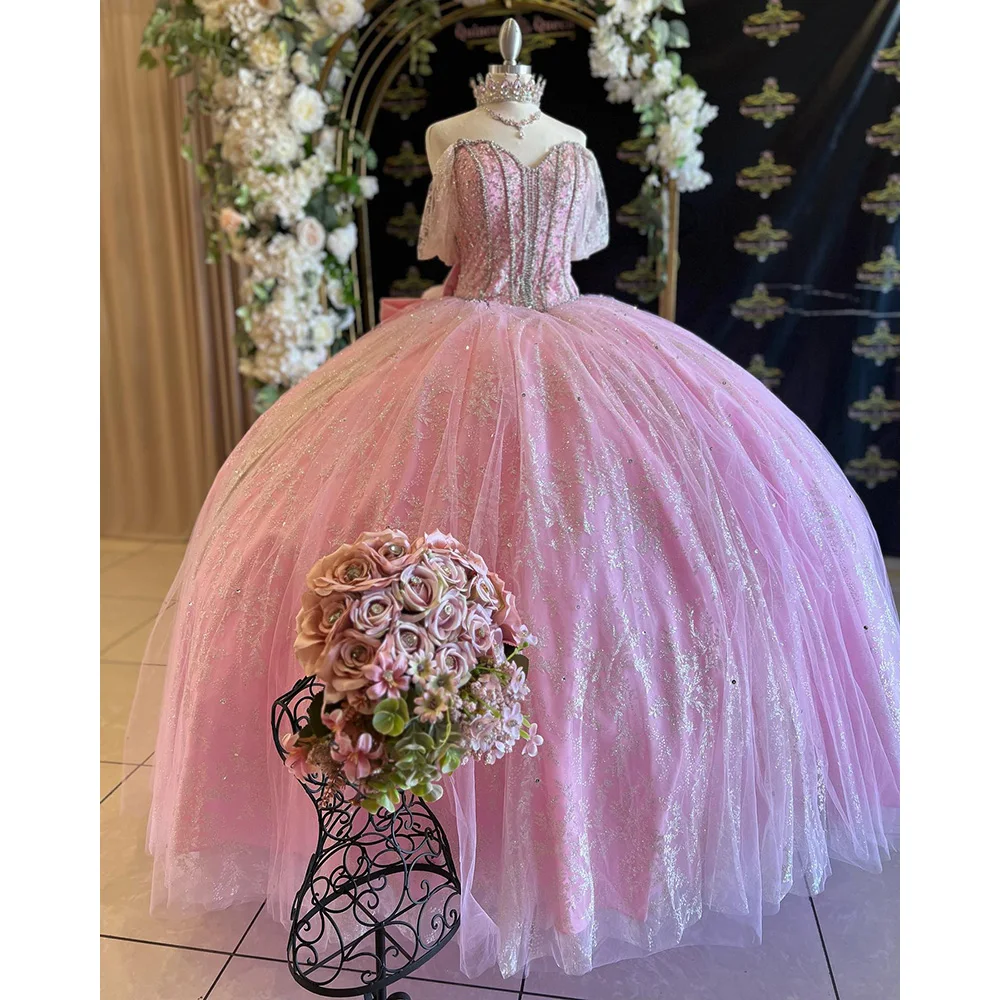 Pink Glitter Crystal Beading Ball Gown Quinceanera Dresses Spaghetti Straps Sequined Lace Bow Corset Vestidos De 15 Años
Pink Glitter Crystal Beading Ball Gown Quinceanera Dresses Spaghetti Straps Sequined Lace Bow Corset Vestidos De 15 Años