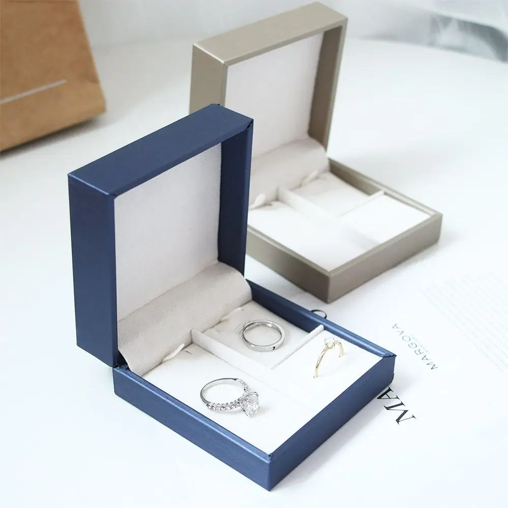Коробка для хранения ювелирных изделий, Квадратный держатель для колец из искусственной кожи, магнитная коробка для хранения колец, шкатулки для хранения серег 
Коробка для хранения ювелирных изделий, Квадратный держатель для колец из искусственной кожи, магнитная коробка для хранения колец, шкатулки для хранения серег