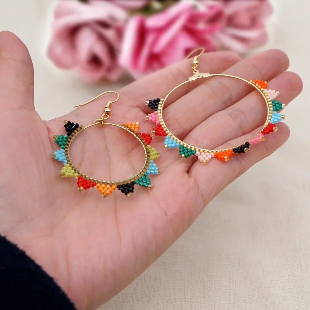

Rice bead earrings Circle Rainbow Sunflower Originality Hand knitting Bohemia Alloy Fashion Simple Beaded earrings