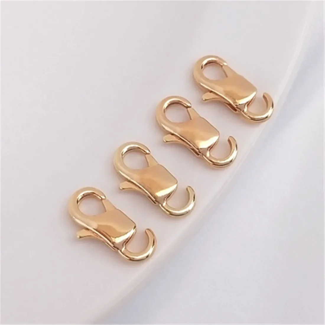 14K Gold-plated Korean-made Open Lobster Buckle Fishtail Spring Buckle Diy Bracelet Necklace Ending Connection Buckle Accessorie
14K Gold-plated Korean-made Open Lobster Buckle Fishtail Spring Buckle Diy Bracelet Necklace Ending Connection Buckle Accessorie