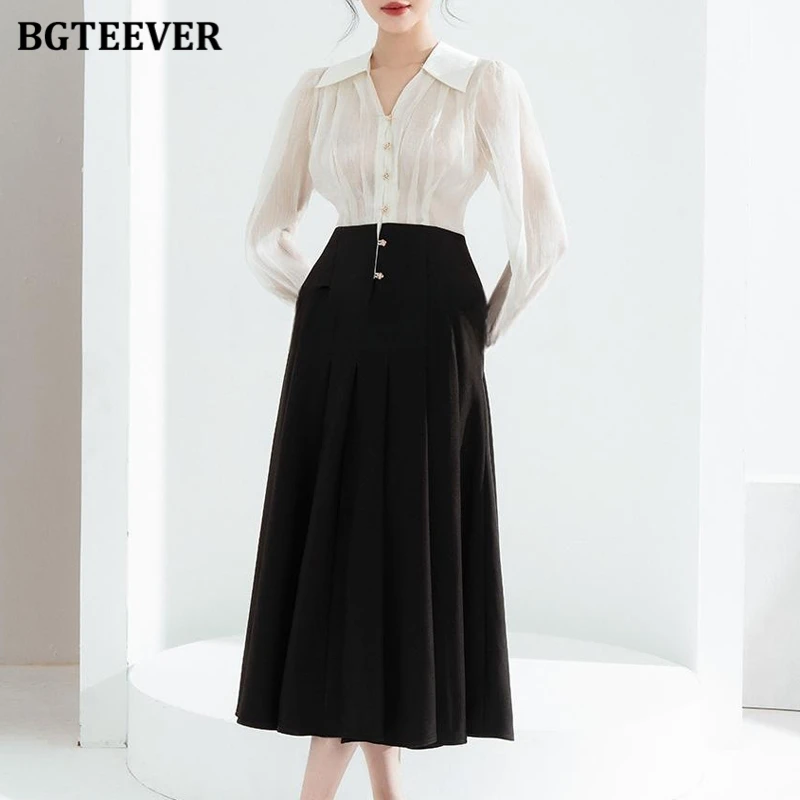 BGTEEVER осенний стильный женский комплект из 2 предметов юбка с длинным рукавом однобортная женская блузка рубашка черная трапециевидная юбка женская 
BGTEEVER осенний стильный женский комплект из 2 предметов юбка с длинным рукавом однобортная женская блузка рубашка черная трапециевидная юбка женская