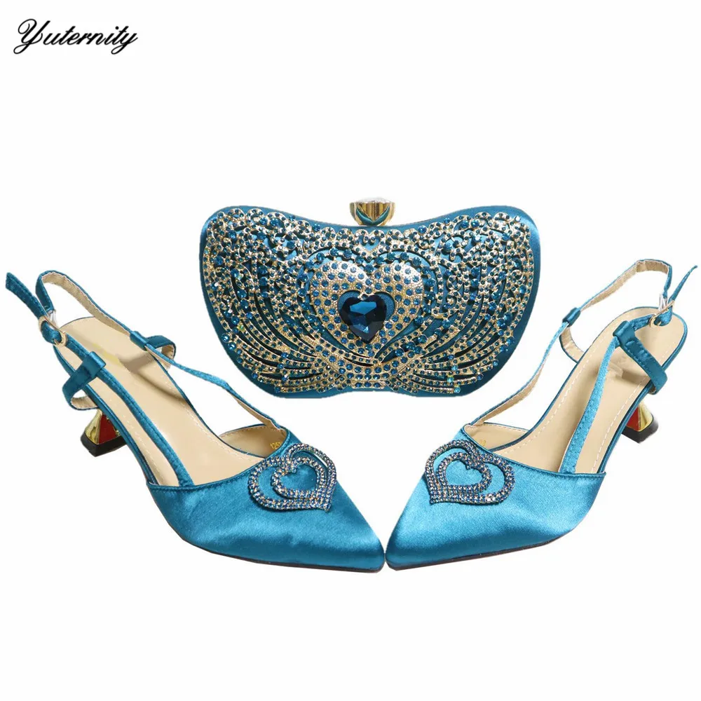 Latest African Luxurious Shoes And Bag Set High Quality Rhinestone High Heels Women Shoes And Bag Set For Party Dress
Latest African Luxurious Shoes And Bag Set High Quality Rhinestone High Heels Women Shoes And Bag Set For Party Dress