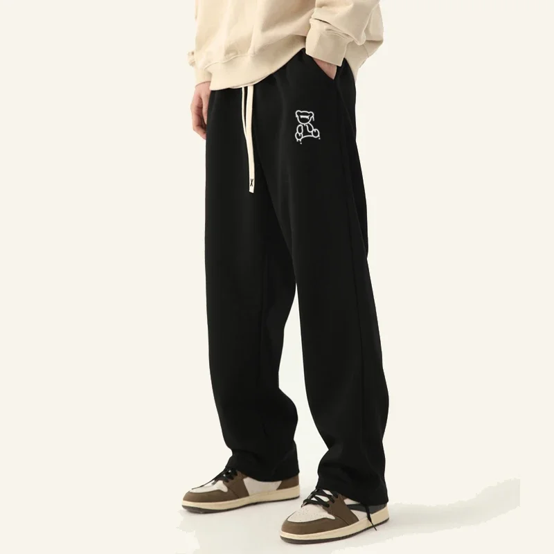 New men's bear print slacks, jogging sweatpants, black baggy pantish, street menswear
New men's bear print slacks, jogging sweatpants, black baggy pantish, street menswear