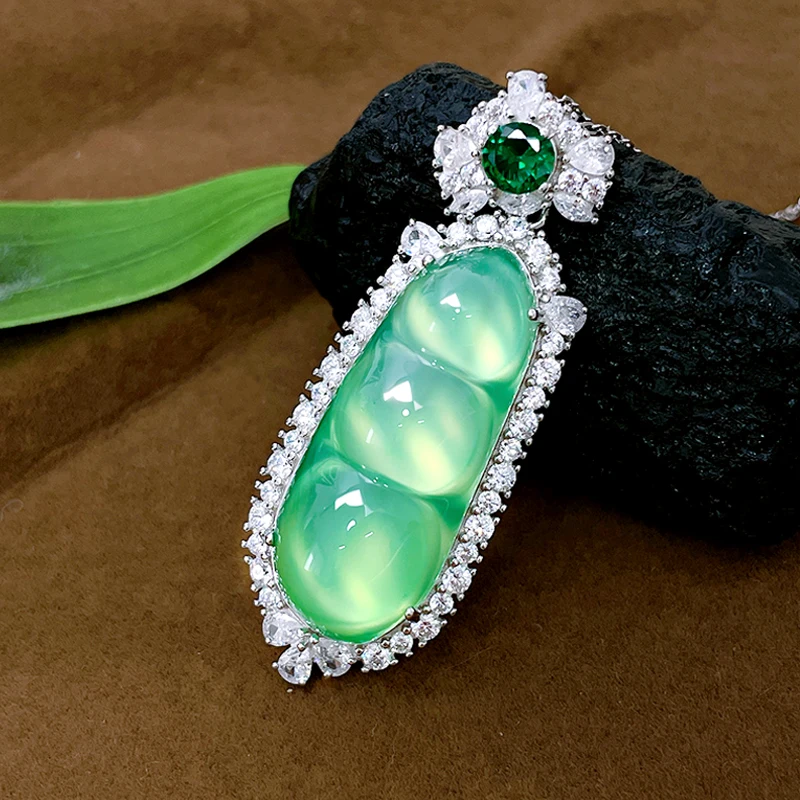 National Style Green Fluorescent Ice Type Jade Pulp Lucky Bean Necklace 925 Silver Pendant Comparable To Jade
National Style Green Fluorescent Ice Type Jade Pulp Lucky Bean Necklace 925 Silver Pendant Comparable To Jade