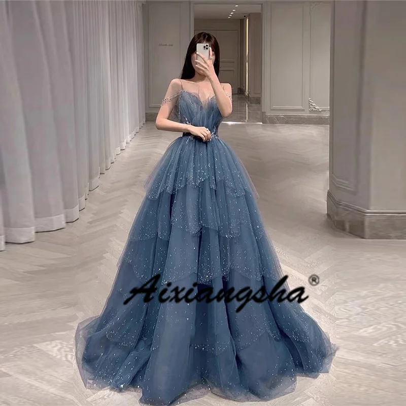 

2022 Sparkly Dusty Blue Tulle Layered Skirt Prom Dresses Spaghetti Straps Sweetheart 3D Flowers Sequin Long Evening Gown