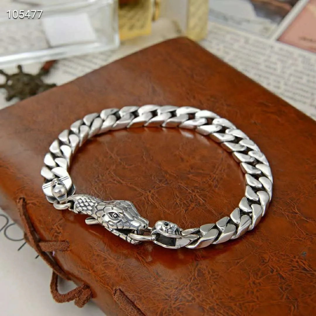 

Domineering men's thick snake bracelet s925 pure silver flat chain python snake head skull minimalist Thai silver single trend