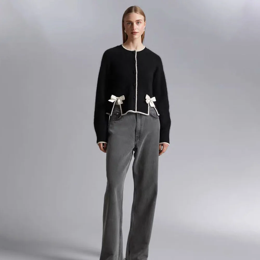 French OS223 autumn and winter new satin feeling sweet bow wool blend round neck knitted cardigan women
French OS223 autumn and winter new satin feeling sweet bow wool blend round neck knitted cardigan women