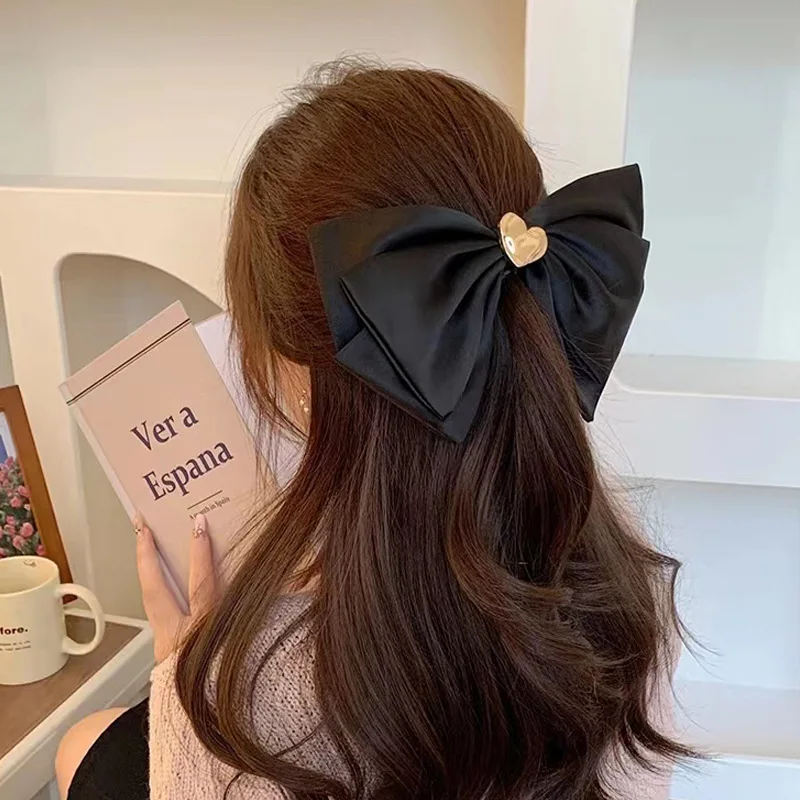 Korean silk large bow love hairpin temperament back head top clip spring clip hairpin ponytail clip headpiece
Korean silk large bow love hairpin temperament back head top clip spring clip hairpin ponytail clip headpiece