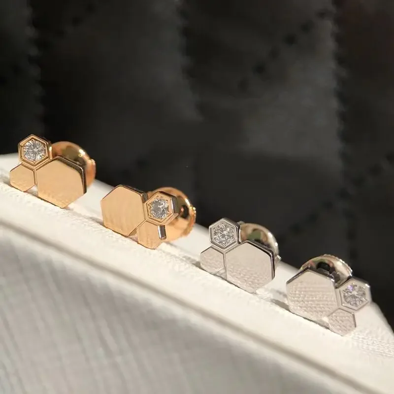 High quality hot selling brand 925 sterling silver hexagonal honeycomb women's earrings minimalist fashion luxury party jewelry
High quality hot selling brand 925 sterling silver hexagonal honeycomb women's earrings minimalist fashion luxury party jewelry