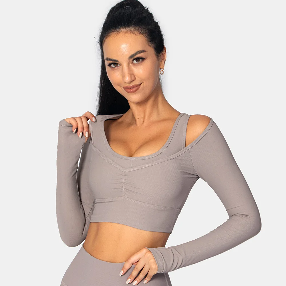 New Women Sports Fitness Suit Top Women Sexy Tight Long Sleeve Quick-drying Coat Running Autumn and Winter Yoga Top 
New Women Sports Fitness Suit Top Women Sexy Tight Long Sleeve Quick-drying Coat Running Autumn and Winter Yoga Top