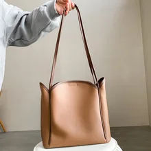 New Preppy Style Women's Shoulder Bag Luxury Handbags Large Capacity Cowhide Commuter Leather Women's Bag Bucket Bag
New Preppy Style Women's Shoulder Bag Luxury Handbags Large Capacity Cowhide Commuter Leather Women's Bag Bucket Bag