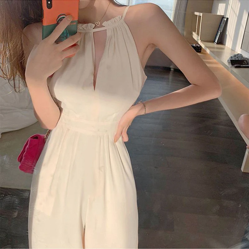 2023 Women Jumpsuit Summer Sexy Halterneck Sleeveless White Jumpsuits High Streetwear Bodycon Wide Leg Romper 
2023 Women Jumpsuit Summer Sexy Halterneck Sleeveless White Jumpsuits High Streetwear Bodycon Wide Leg Romper