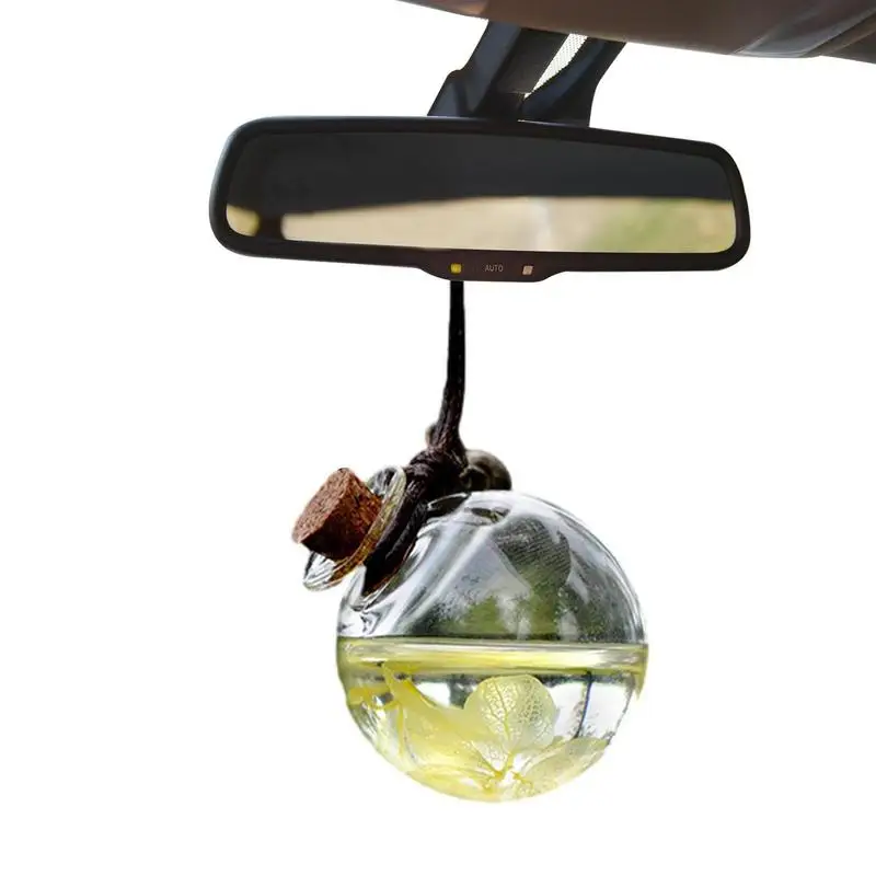 Car Perfume Glass Bottle Empty Glass Bottle With Flower Car Mirror Aromatherapy Fragrance Hanging Pendant Rearview Mirror
Car Perfume Glass Bottle Empty Glass Bottle With Flower Car Mirror Aromatherapy Fragrance Hanging Pendant Rearview Mirror