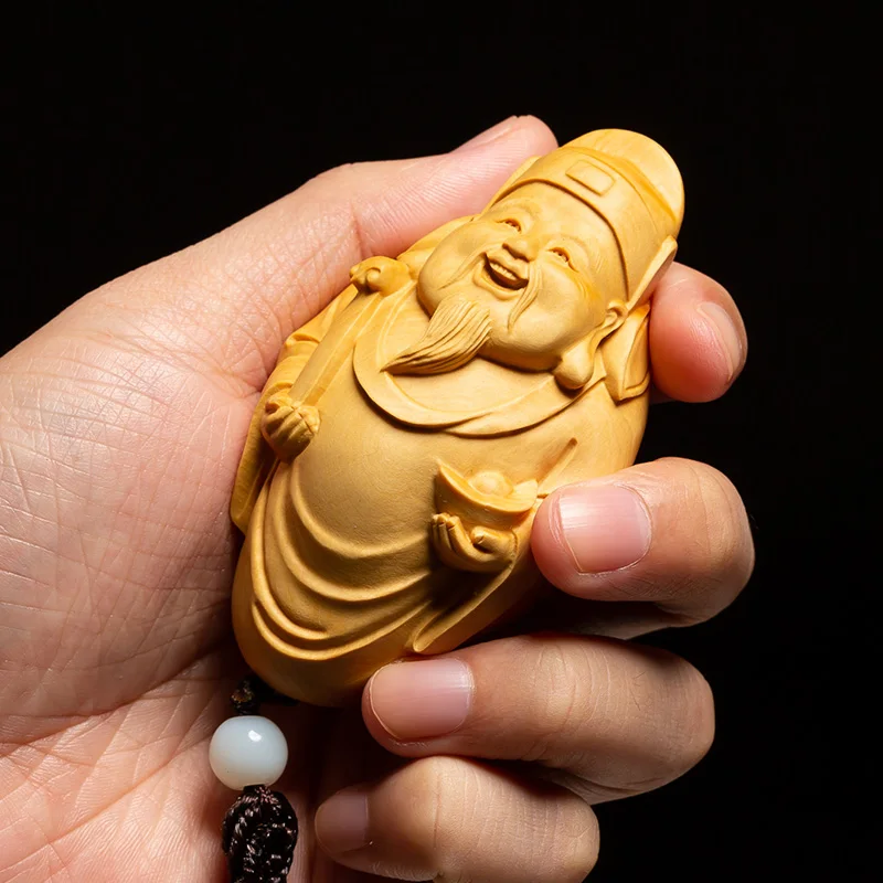Boxwood solid wood pendant hand hand piece of carving arts and crafts God of Fortune Buddha wood carving play decoration
Boxwood solid wood pendant hand hand piece of carving arts and crafts God of Fortune Buddha wood carving play decoration