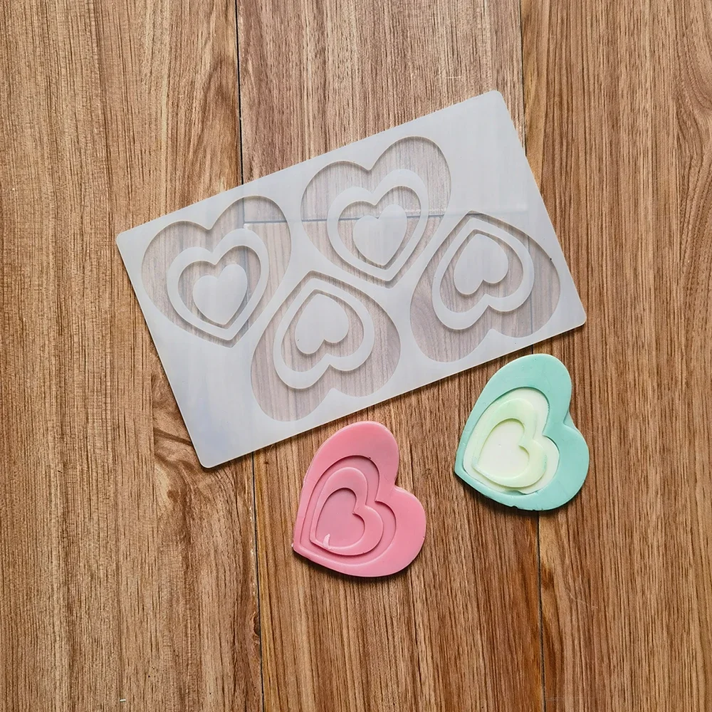 Double hole love shaped chocolate silicone mold DIY candy pudding dessert mold cake decoration plug-in kitchen baking utensils
Double hole love shaped chocolate silicone mold DIY candy pudding dessert mold cake decoration plug-in kitchen baking utensils