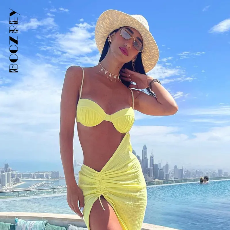 

BoozRey Fashion Solid color suspender Sexy Hollowed out Slit slim summer dress 2023 Spice Girl Club seaside resort style dress