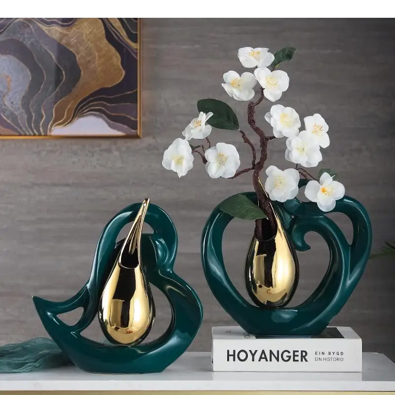 Creative Heart Shaped Ceramic Vases Golden Drop Shaped Flower Arrangement Hollow Porcelain Vase Flower Insert Modern Home Decor
Creative Heart Shaped Ceramic Vases Golden Drop Shaped Flower Arrangement Hollow Porcelain Vase Flower Insert Modern Home Decor