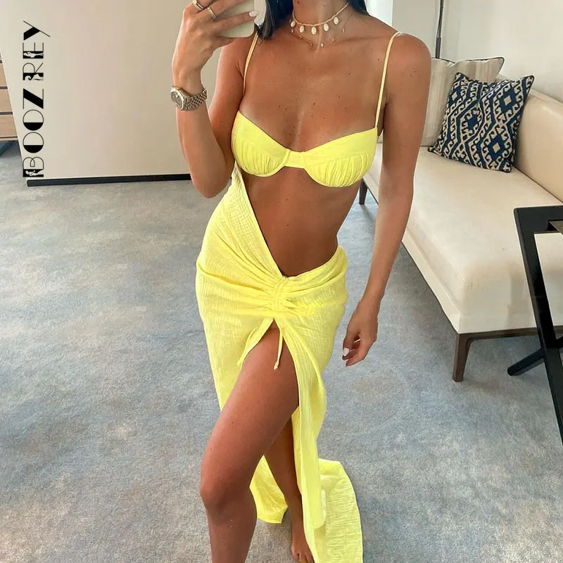 

BoozRey Fashion Solid color suspender Sexy Hollowed out Slit slim summer dress 2023 Spice Girl Club seaside resort style dress