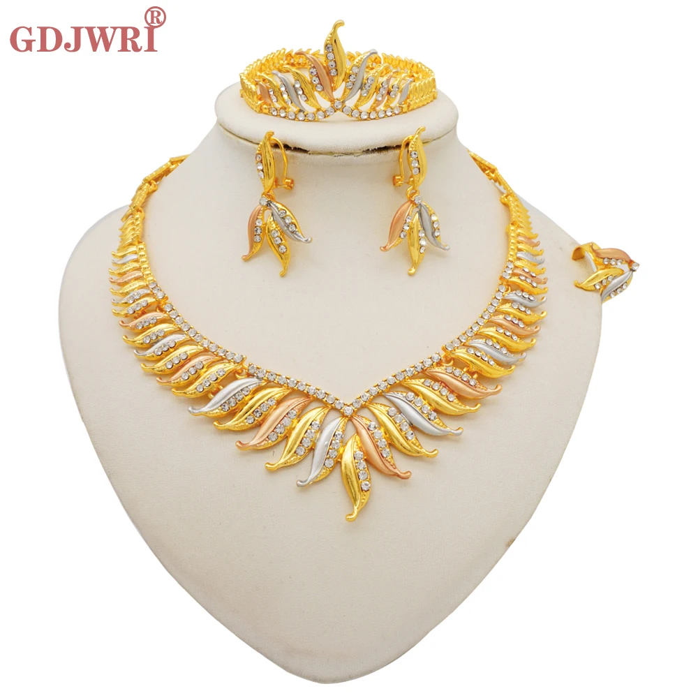 Fashion Women African Beads Jewellery Crystal Necklace Earring Ring Bracelet Jewelry Set Gold Color Statement Accessories
Fashion Women African Beads Jewellery Crystal Necklace Earring Ring Bracelet Jewelry Set Gold Color Statement Accessories