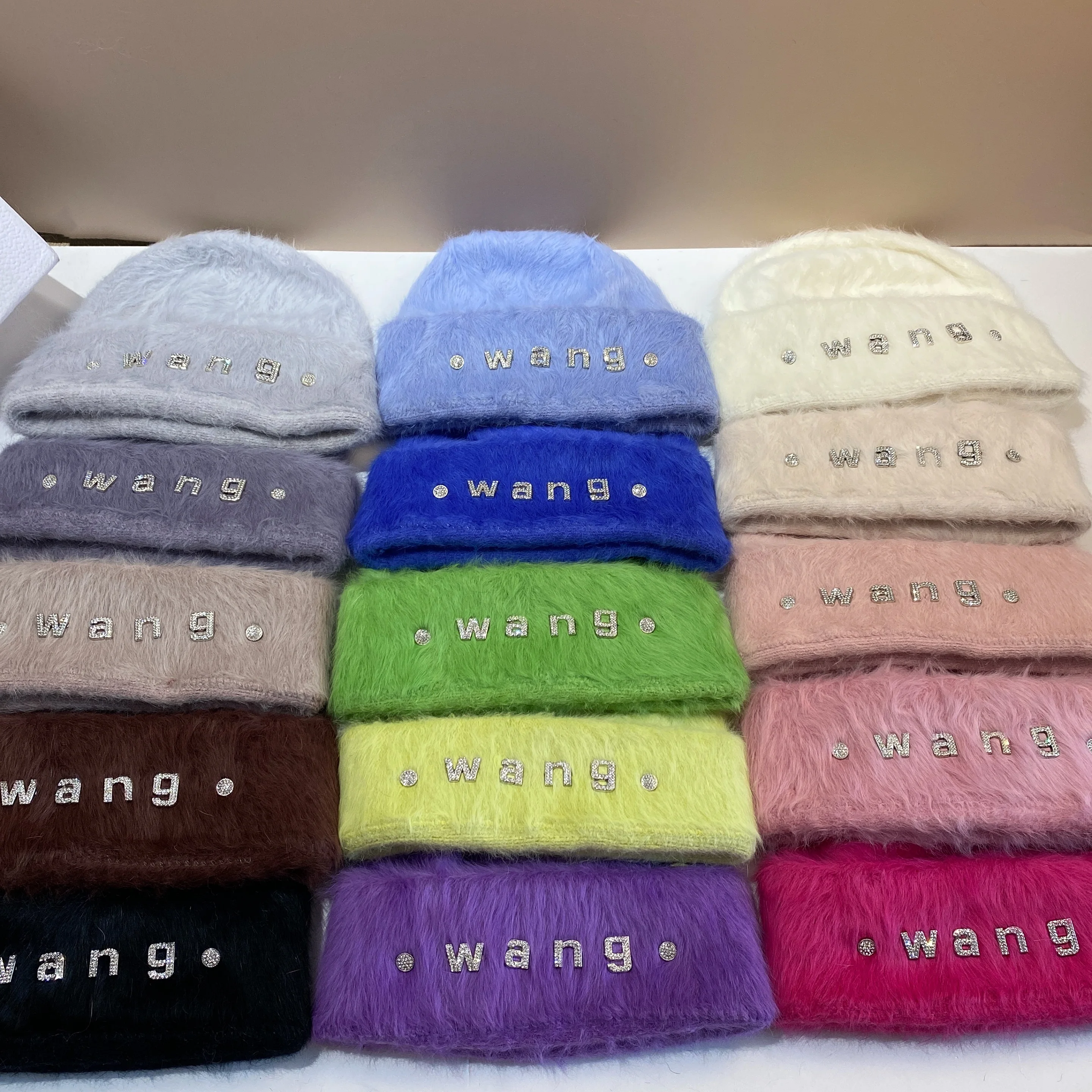 

WANG winter long rabbit hair thermal pullover hat fashion age-reducing Angora plush ear protection knitted hat Bao head hat woma