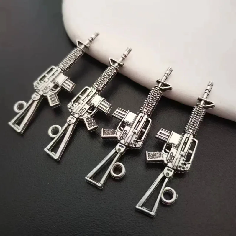 25pcs 45*14mm Antique Silver Alloy Machine Gun Charms Pendant Findings For DIY Jewelry Making
25pcs 45*14mm Antique Silver Alloy Machine Gun Charms Pendant Findings For DIY Jewelry Making