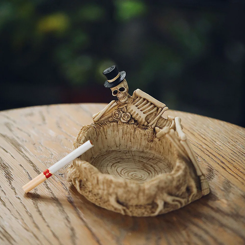 Creative skull ashtray decoration Resin imitation tree root skull personality ornaments Home office bar decorations
Creative skull ashtray decoration Resin imitation tree root skull personality ornaments Home office bar decorations