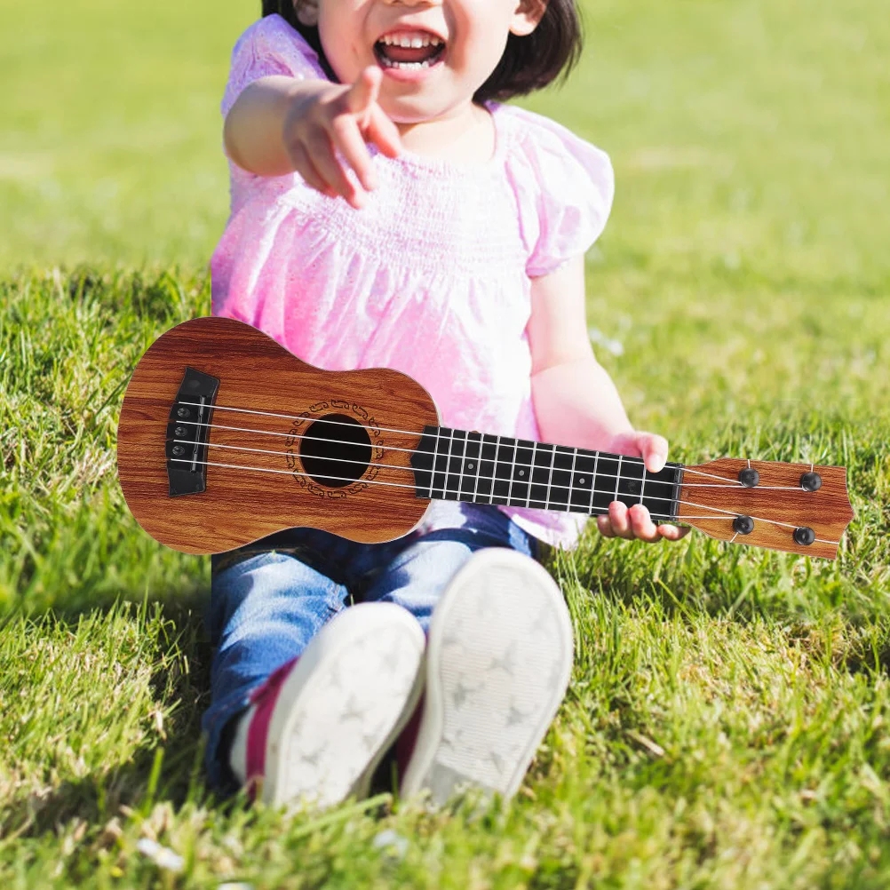 Ukulele Kids Musical Learning Toy Toddler Mini Guitar Instrument Educational Early Toys
Ukulele Kids Musical Learning Toy Toddler Mini Guitar Instrument Educational Early Toys
