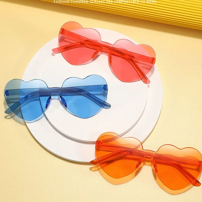 New In Heart Loving Sunglasses for Women Jelly Color Frameless Heart Shaped One-piece Glasses Dazzling Color Glasses
New In Heart Loving Sunglasses for Women Jelly Color Frameless Heart Shaped One-piece Glasses Dazzling Color Glasses