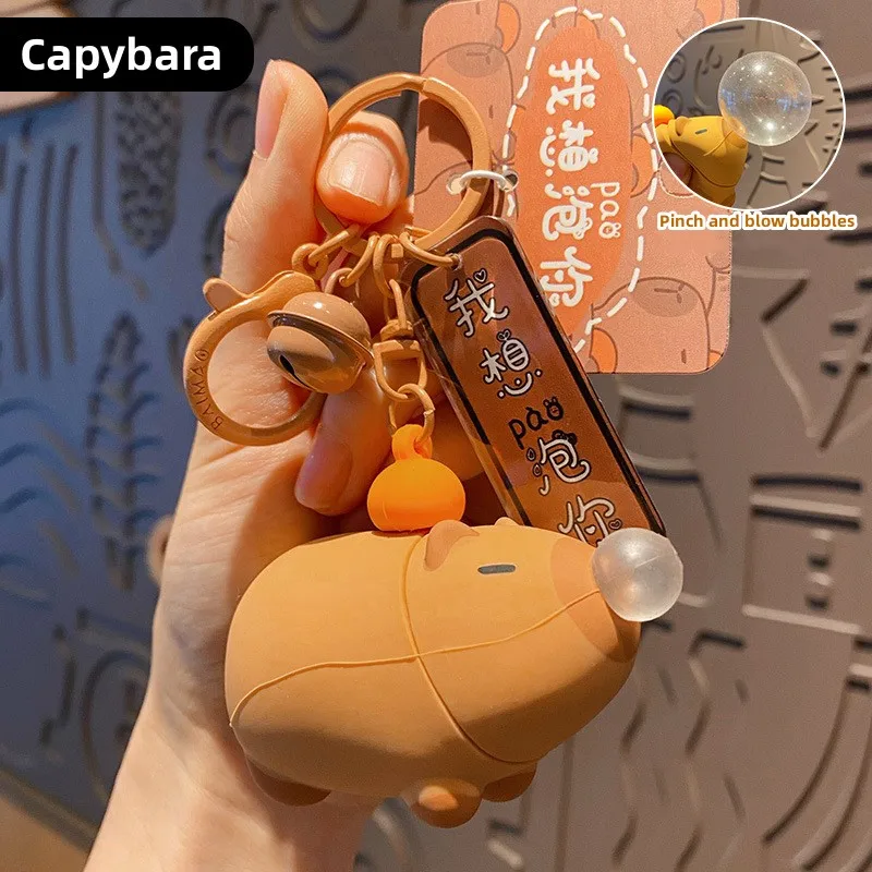 Kawaii Capybara Keychain Pendant To Decompress and Blow Bubbles, Capybara Cartoon Figure, Decompression Toy, School Bag Pendant
Kawaii Capybara Keychain Pendant To Decompress and Blow Bubbles, Capybara Cartoon Figure, Decompression Toy, School Bag Pendant