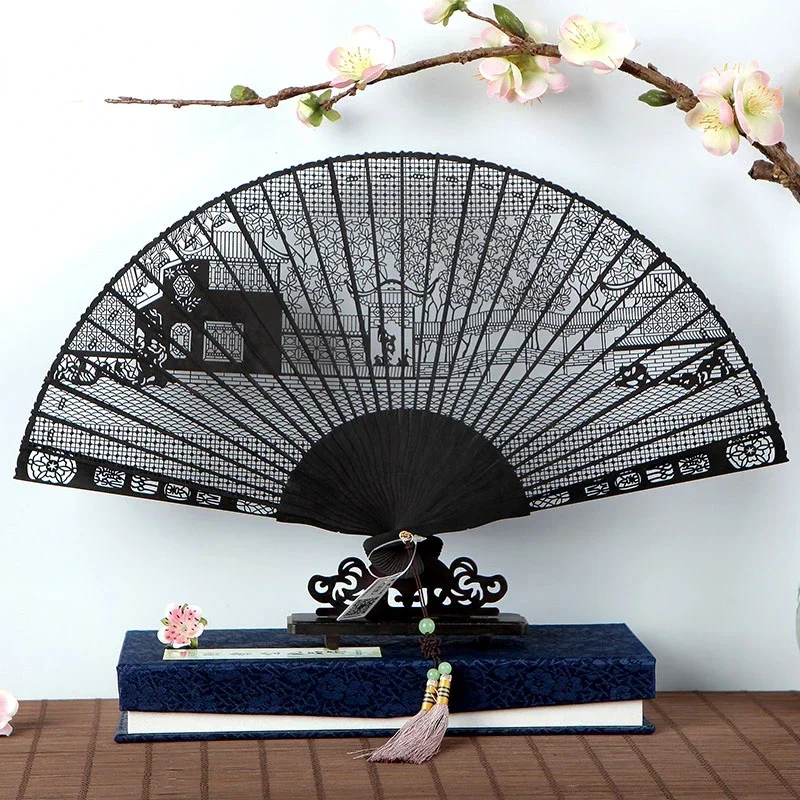 Chinese Classical Folding Fan Ebony Hollow Out Carved Exquisite Hand Fan Handmade Cultural Craft Gift Home Decorative Ventilador
Chinese Classical Folding Fan Ebony Hollow Out Carved Exquisite Hand Fan Handmade Cultural Craft Gift Home Decorative Ventilador
