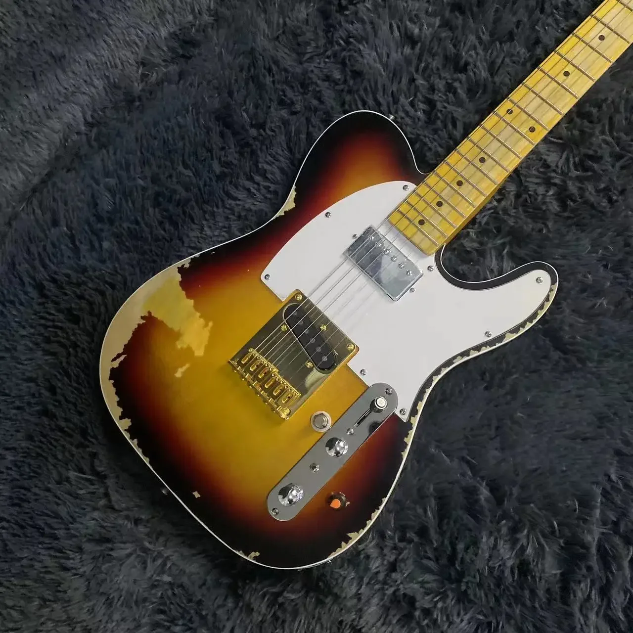Электрическая гитара Relic Tele, винтажный цвет Sunburst, корпус из липы, версия Andy Edition, 6-струнная гитара, скрипан, бесплатная доставка
Электрическая гитара Relic Tele, винтажный цвет Sunburst, корпус из липы, версия Andy Edition, 6-струнная гитара, скрипан, бесплатная доставка